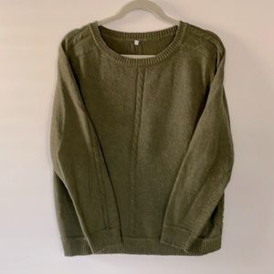 Pretty green sweater with cable detail.
